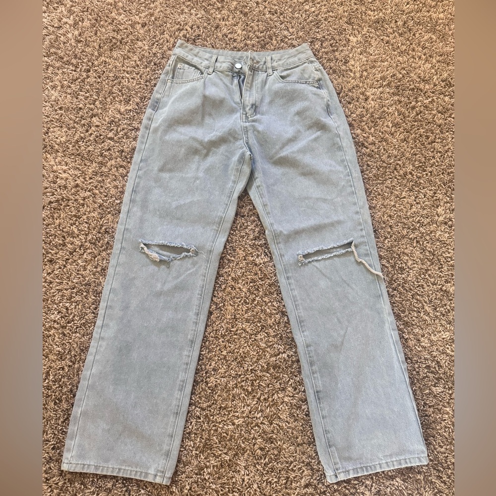Women’s jeans. Size medium, I’d guess 6-8